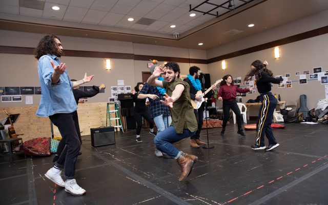 The cast of We Live in Cairo in rehearsal.